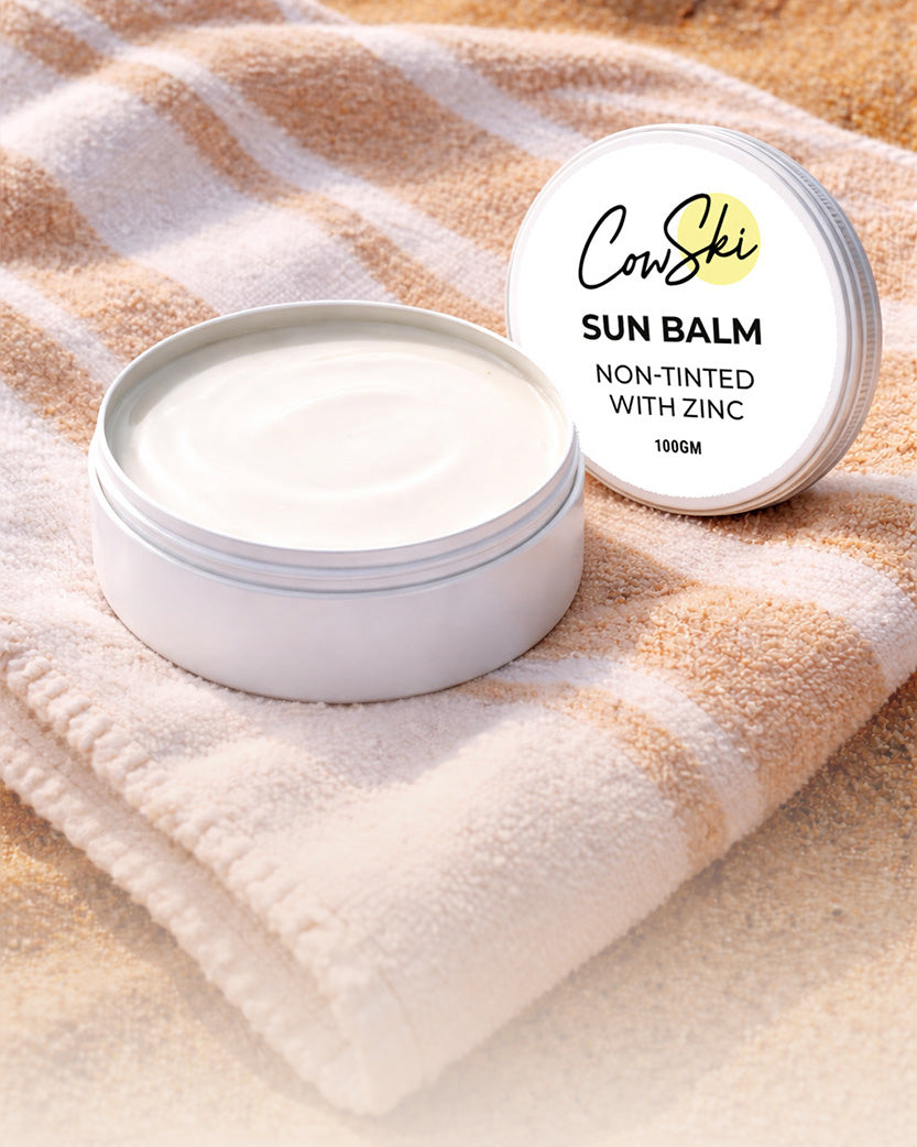 1 containers of CowSki Sun Balm on a beige towel